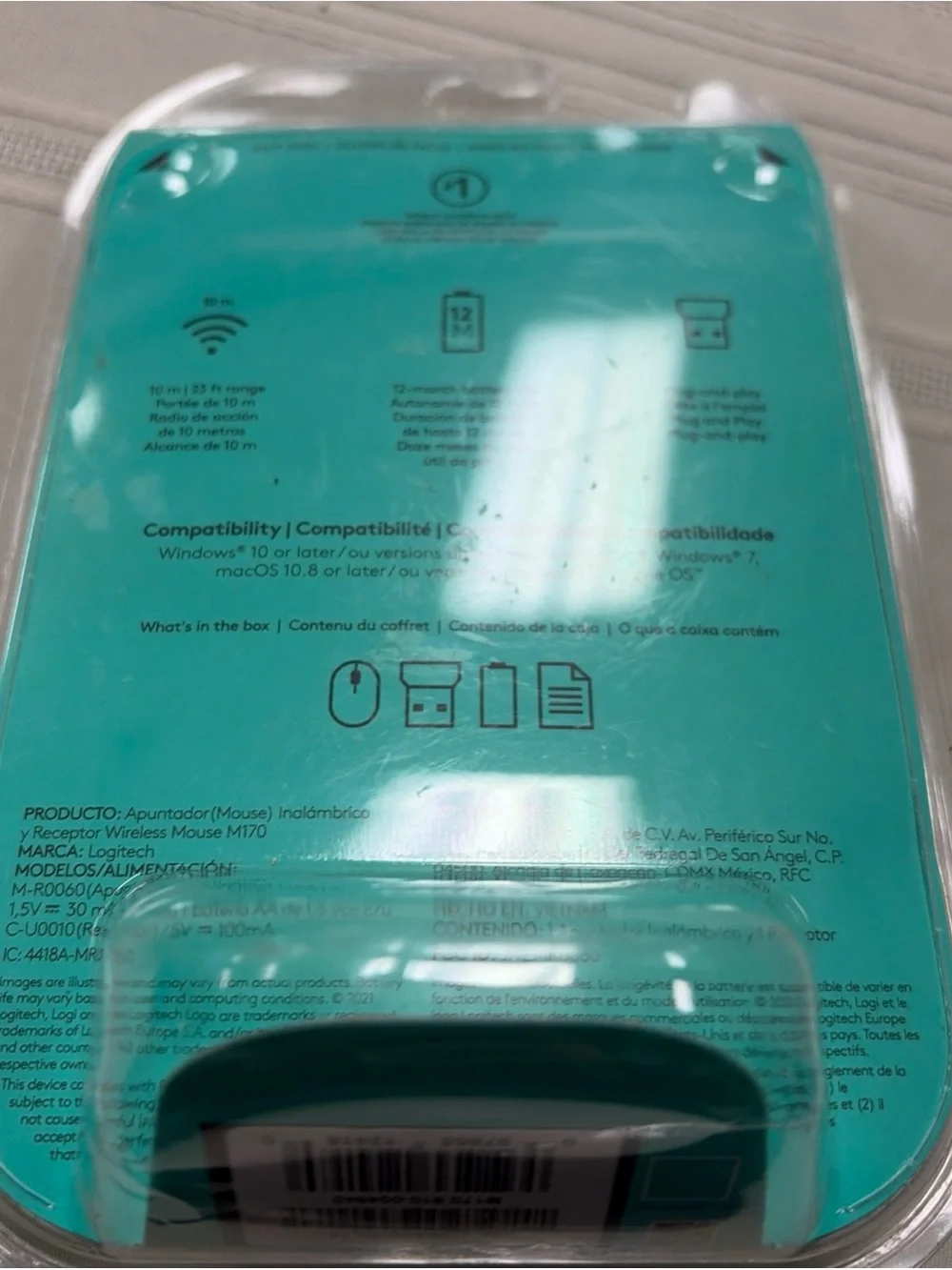 Logitech Wireless Mouse in Teal/Black